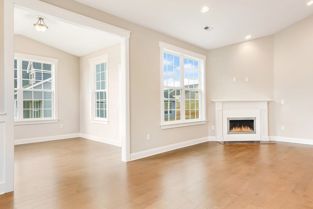 https://assets.windsorhomes.us/img/Cary-3_A_BD_lot57_3245-Castlerock-(6)-fireplace.jpg