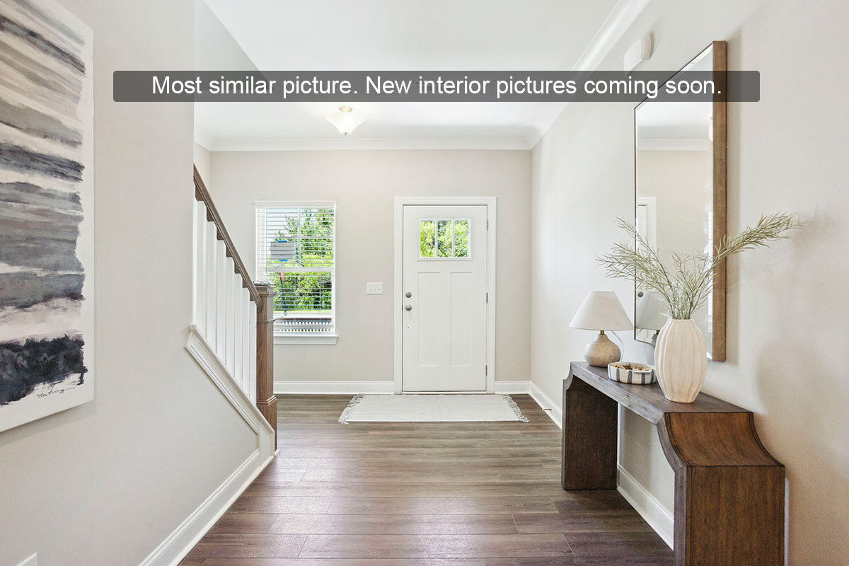https://assets.windsorhomes.us/img/Columbus_RW_lot40_308_Lusterleaf_Ln_Unit-2_foyer_most_similar_photo.jpg