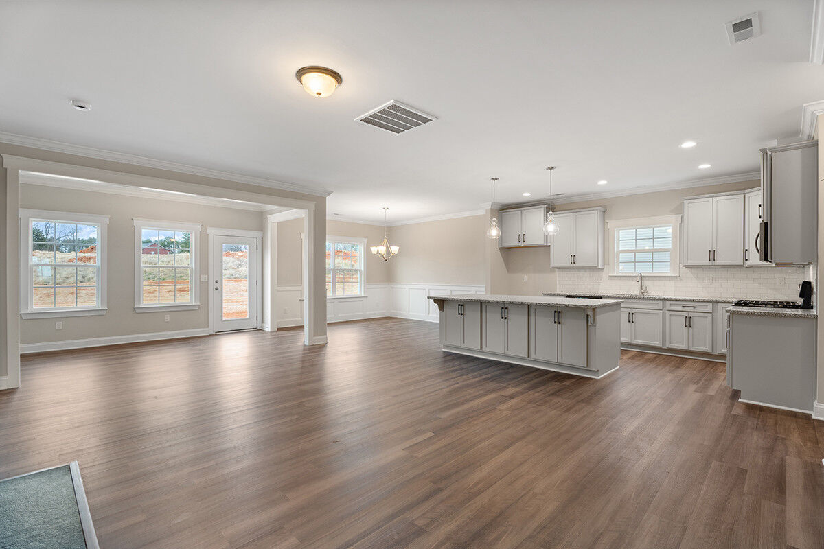 https://assets.windsorhomes.us/img/MLF_lot41_Pinehurst_elvB_112_Rocky_Maple_Drive_great_room_2.jpg