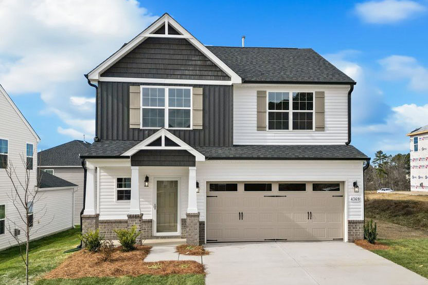 https://assets.windsorhomes.us/img/Southport_B_WP_lot53_4369-Aaron-Place_02-14_front_crop.jpg
