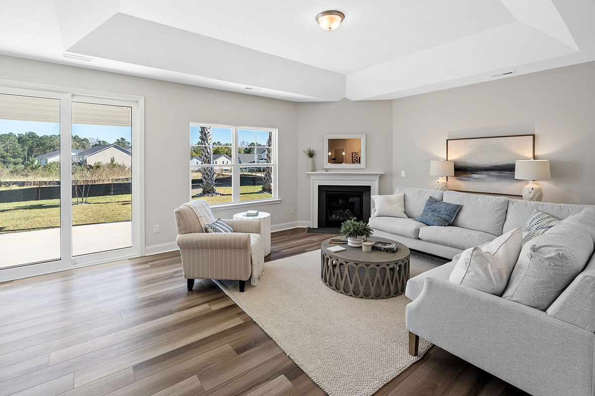 https://assets.windsorhomes.us/img/TT_lot19_Somerset_elvE_1018_Terraces_Ln_Great_Room.jpg