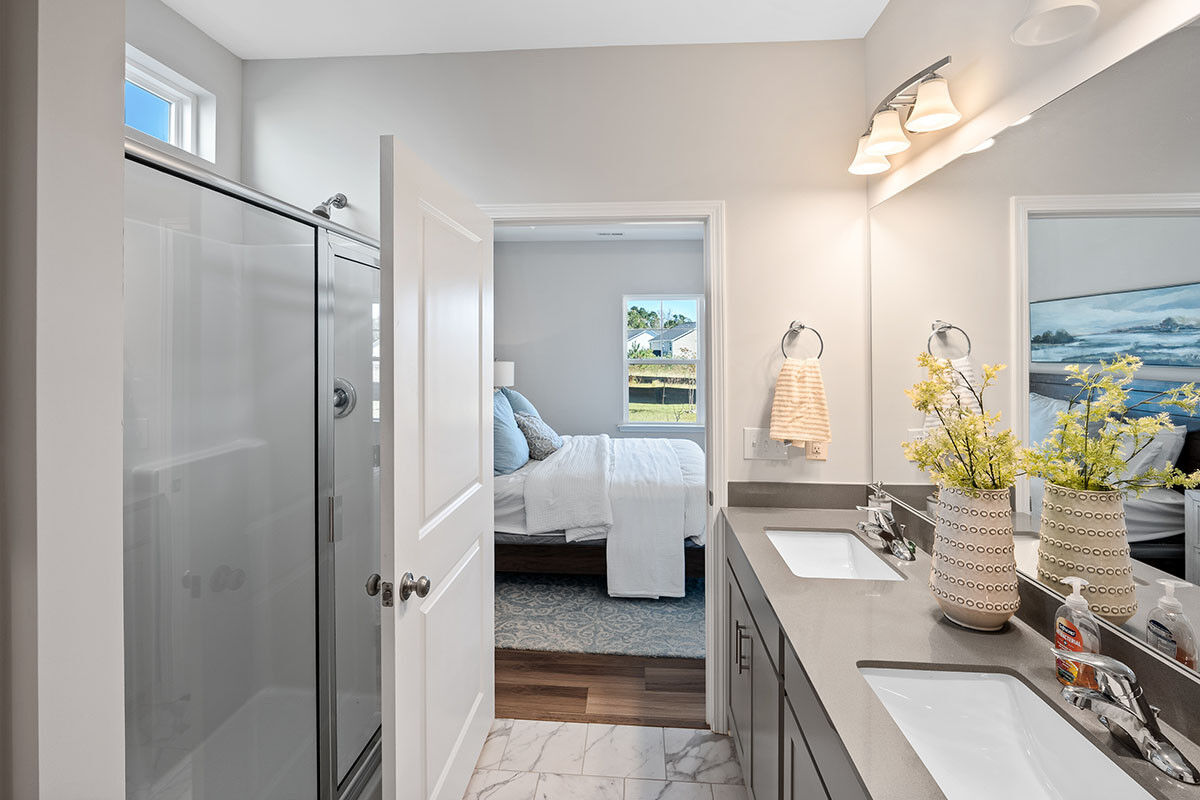 https://assets.windsorhomes.us/img/TT_lot19_Somerset_elvE_1018_Terraces_Ln_Primary_Bath.jpg